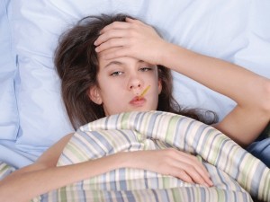 a girl in a bed faking illness